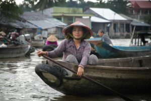 woman paddling on boat