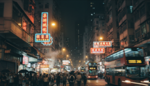Vibrant neon signs illuminating a busy street in Mong Kok at night