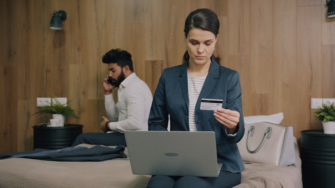 Traveler comparing London hotel booking and reward-night options online