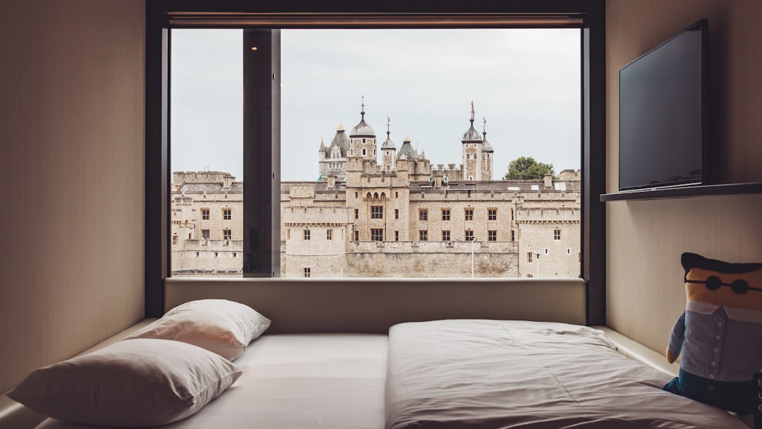Modern hotel room in London with a city view, illustrating accommodation options in London