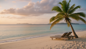 Tranquil morning view of a white sand beach and turquoise ocean during a peaceful resort vacation