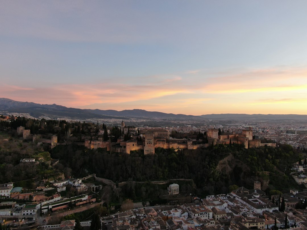 Ávila skyline and historic city walls at sunset