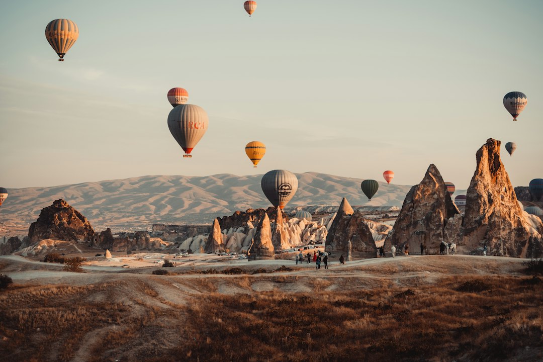 Hot air balloons over Cappadocia at sunrise in Turkey