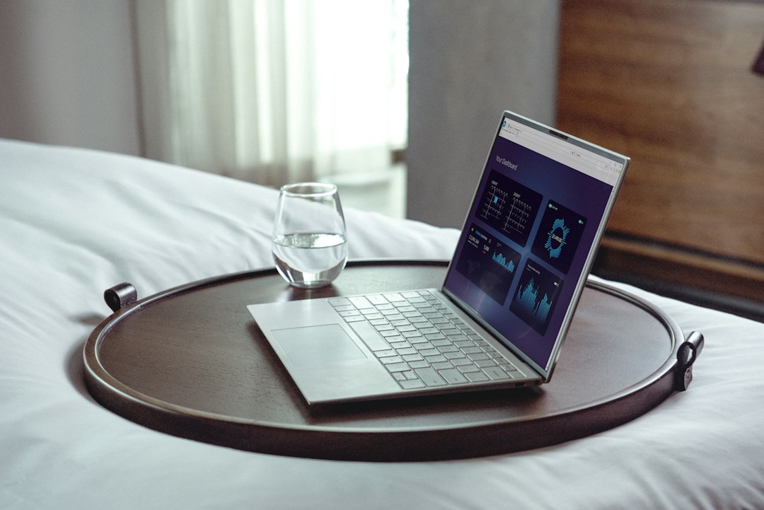 Laptop on a desk illustrating online hotel deal comparison