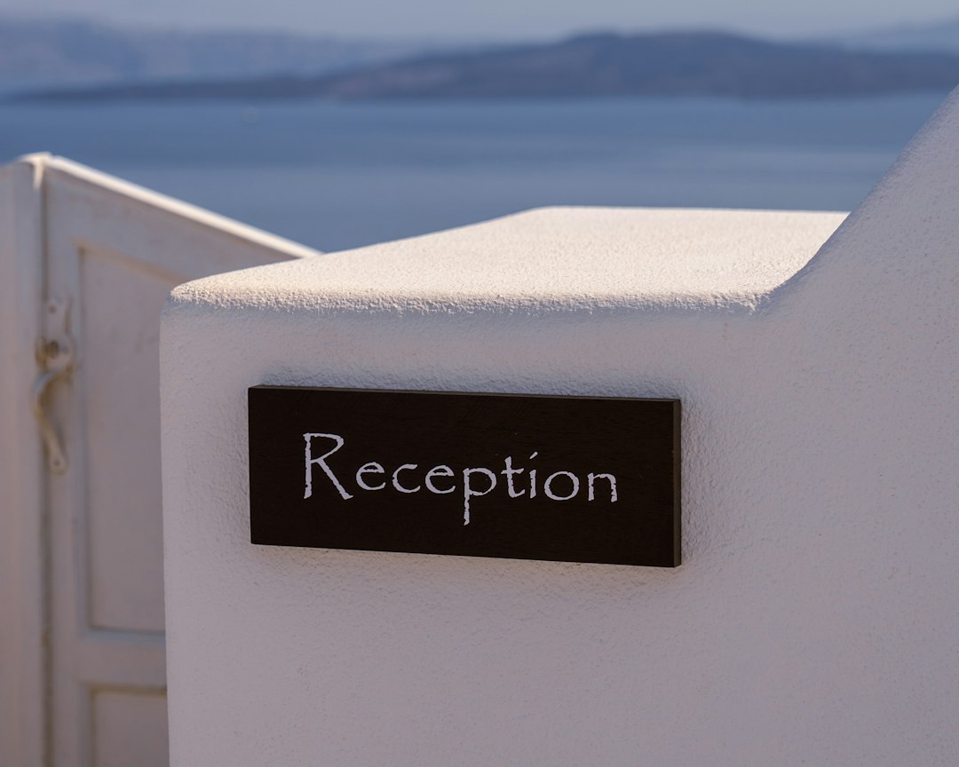 Hotel reception area illustrating online versus in-person booking