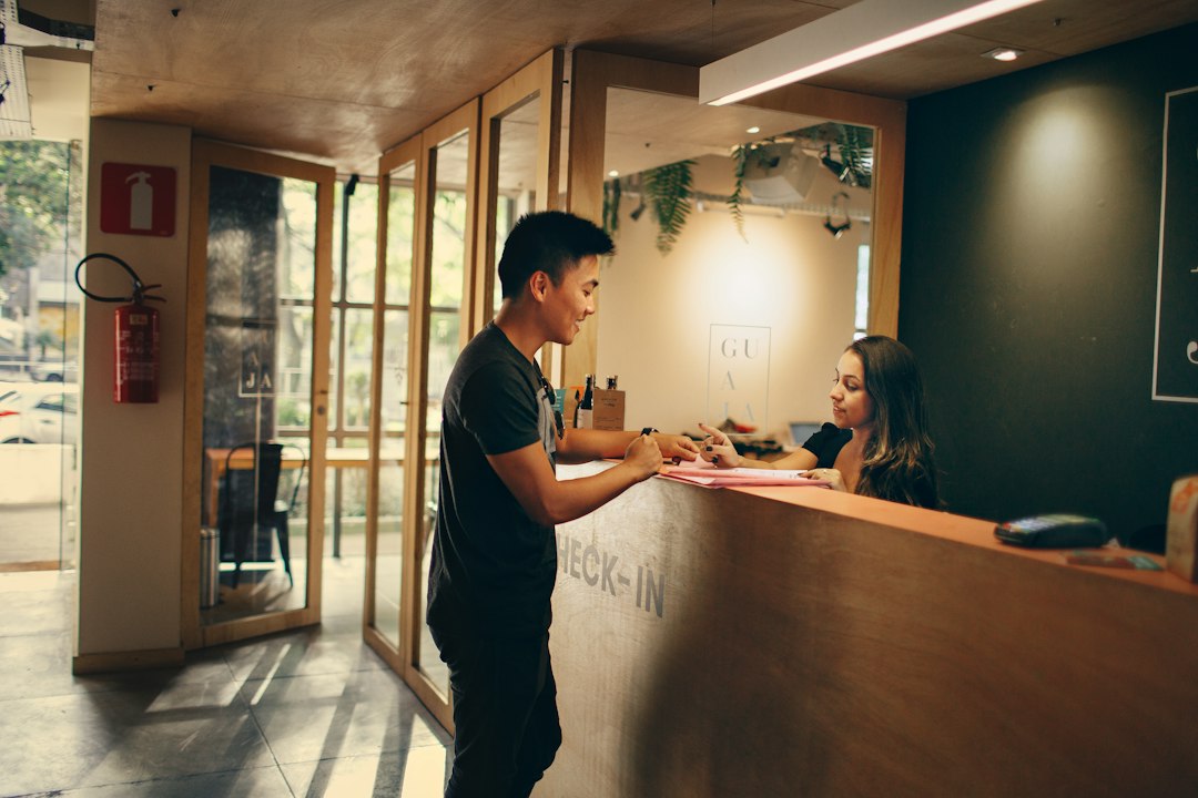 Hotel reception desk illustrating advance versus walk-in booking