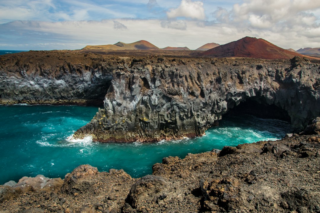 Rocky volcanic cliffs at Los Hervideros on Lanzarote