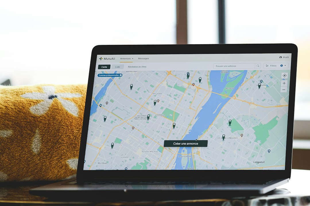 Laptop with a map illustrating online travel agencies and booking platforms