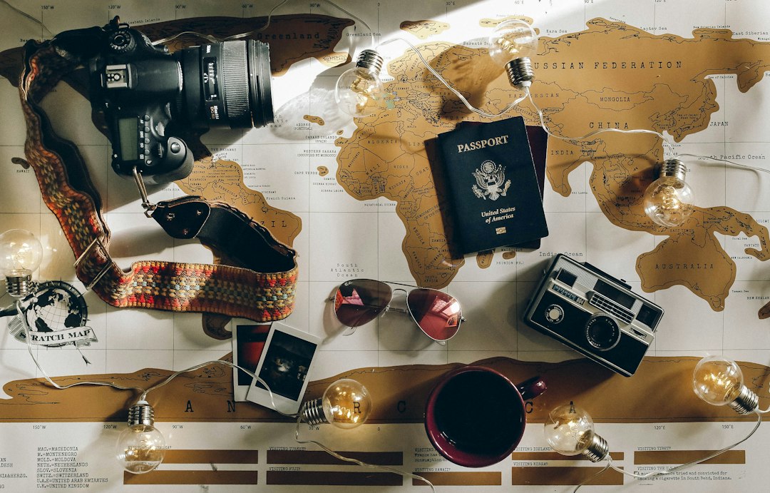 Travel planning flatlay with map and travel items